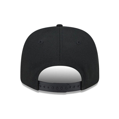 This is a Vancouver Canucks NHL Stated Black 9SEVENTY Stretch Snap Adjustable Cap 7