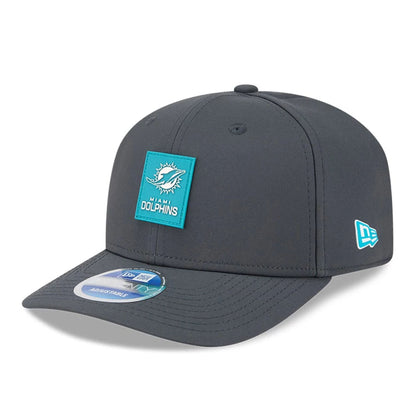 This is a Miami Dolphins NFL Sideline 2025 Charcoal 9SEVENTY Stretch Snap Adjustable Cap 1