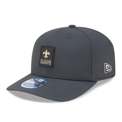 This is a New Orleans Saints NFL Sideline 2025 Charcoal 9SEVENTY Stretch Snap Adjustable Cap 1