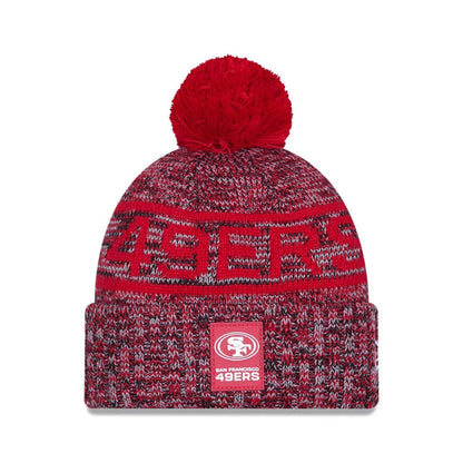 This is a San Francisco 49ers NFL Sideline 2025 Red Sport Knit Beanie Hat 1