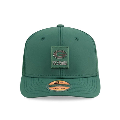 This is a Green Bay Packers NFL Sideline 2025 Dark Green 9SEVENTY Trucker Stretch Snap Adjustable Cap 2