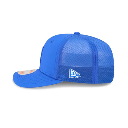 This is a LA Rams NFL Sideline 2025 Bright Blue 9SEVENTY Trucker Stretch Snap Adjustable Cap 4