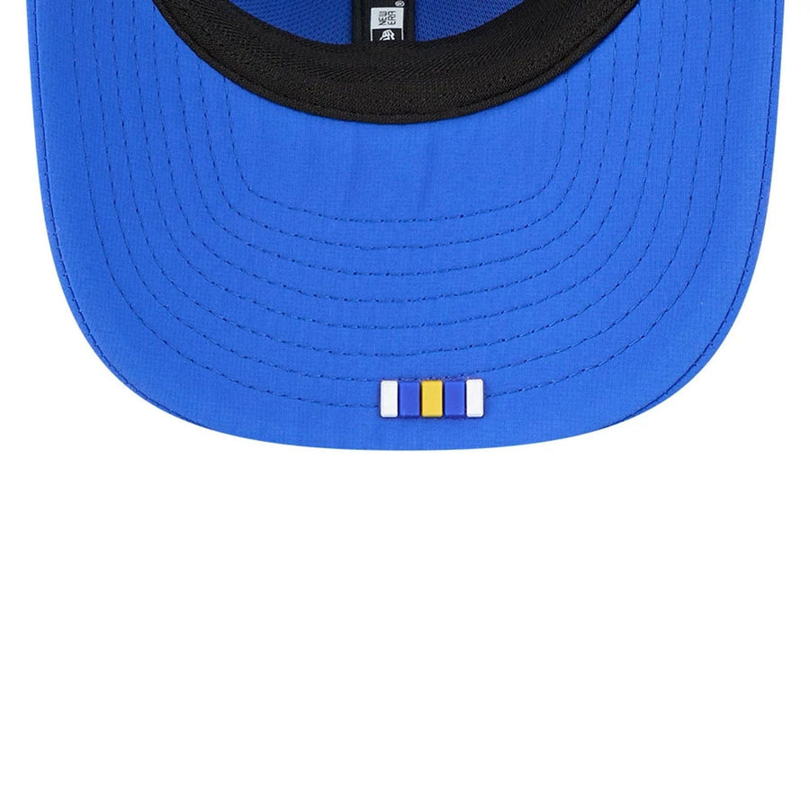 This is a LA Rams NFL Sideline 2025 Bright Blue 9SEVENTY Trucker Stretch Snap Adjustable Cap 6