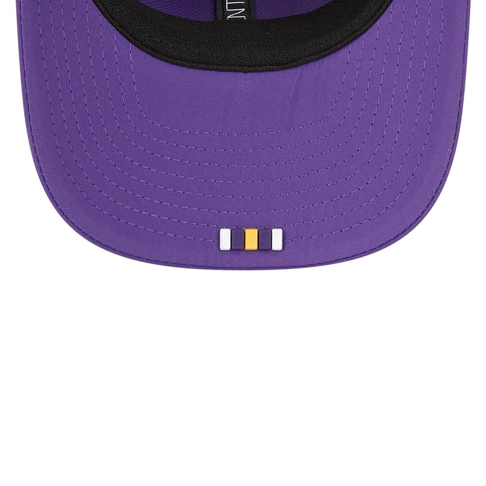 This is a Minnesota Vikings NFL Sideline 2025 Purple 9SEVENTY Trucker Stretch Snap Adjustable Cap 7