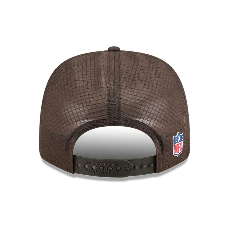 This is a Cleveland Browns NFL Sideline 2025 Dark Brown 9SEVENTY Trucker Stretch Snap Adjustable Cap 7
