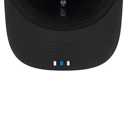 This is a Jacksonville Jaguars NFL Sideline 2025 Black 9SEVENTY Trucker Stretch Snap Adjustable Cap 7