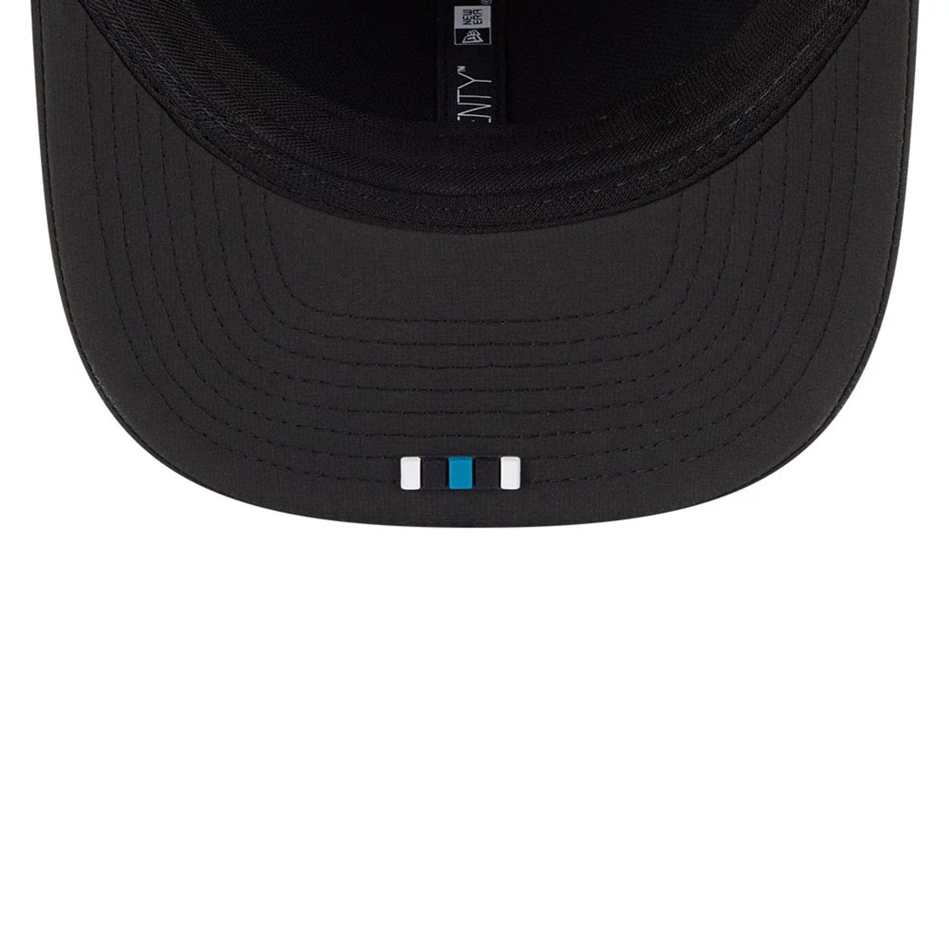 This is a Jacksonville Jaguars NFL Sideline 2025 Black 9SEVENTY Trucker Stretch Snap Adjustable Cap 7