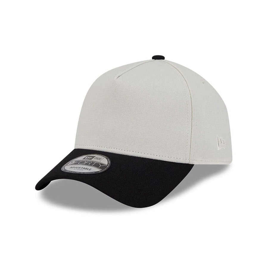 This is a New Era Earth Day White & Black 9FORTY A-Frame Adjustable Cap 1