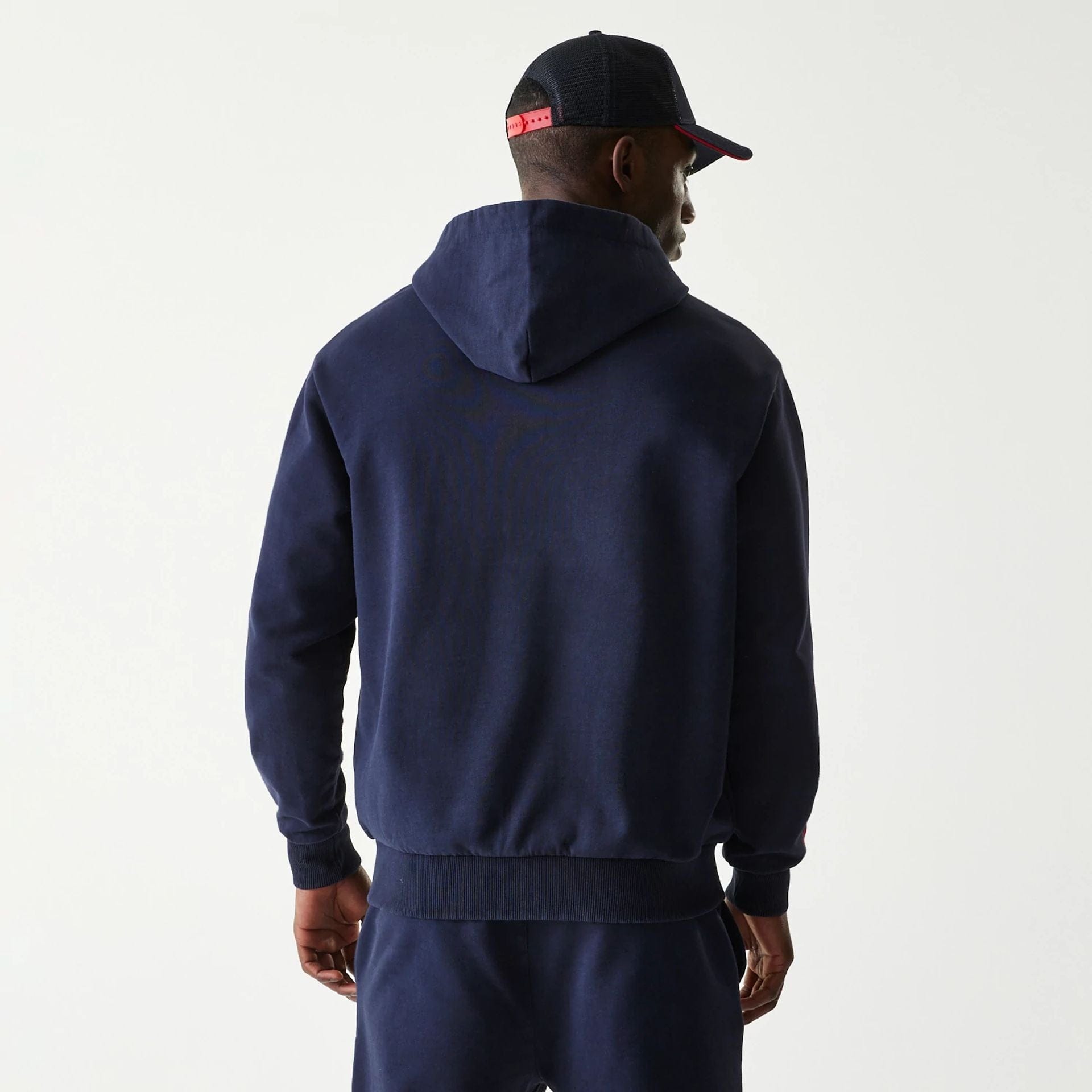 The Male model is wearing Red Bull Racing Dark Blue Oversized Full Zip Hoodie 2