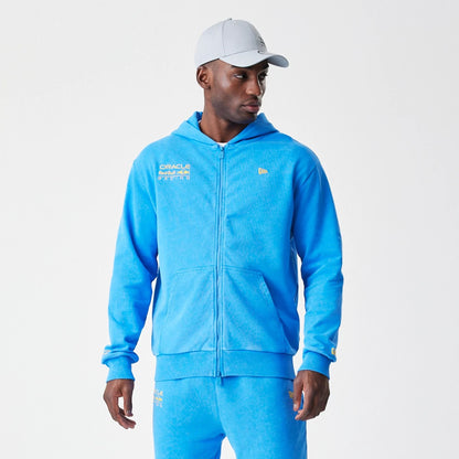 The Male model is wearing Red Bull Racing Blue Oversized Full Zip Hoodie 1