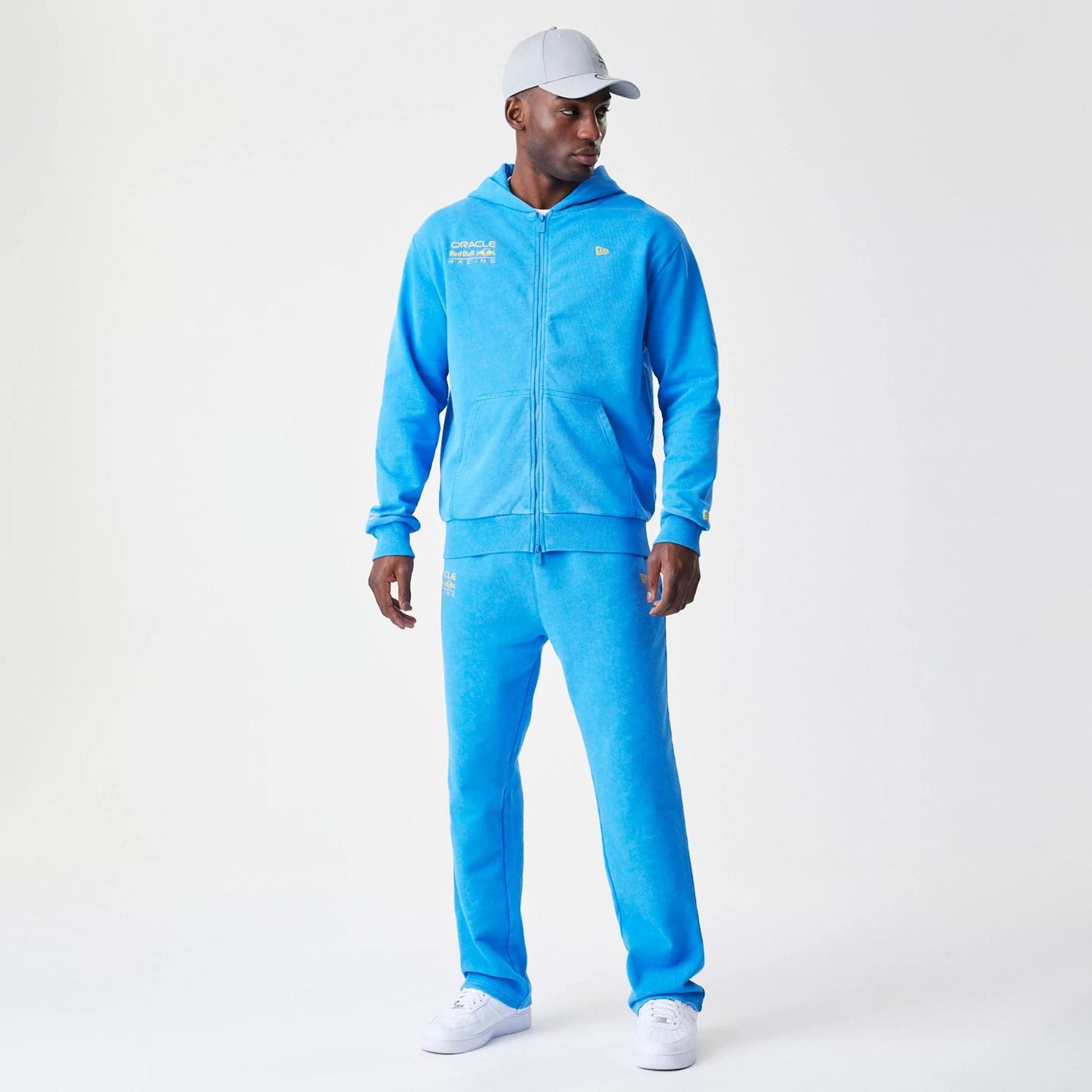 The Male model is wearing Red Bull Racing Blue Oversized Full Zip Hoodie 5
