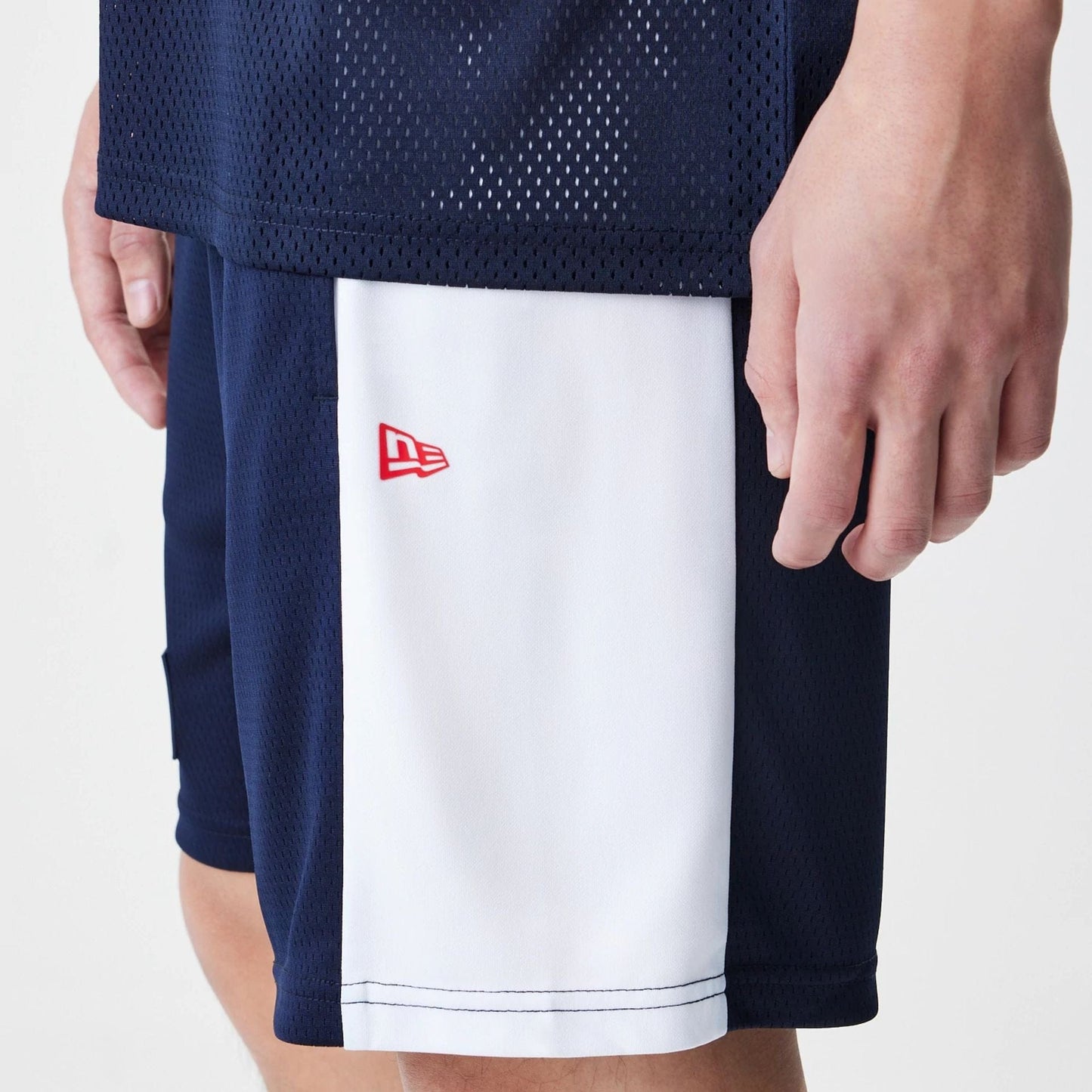 The Male model is wearing Red Bull Racing Graphic Mesh Dark Blue Shorts 4