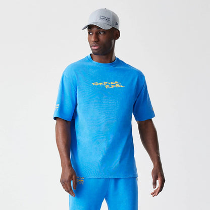 The Male model is wearing Red Bull Racing Back Graphic Blue Oversized T-Shirt 6