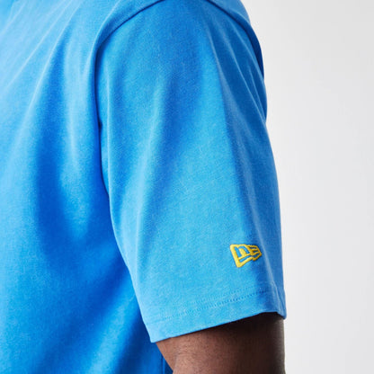 The Male model is wearing Red Bull Racing Back Graphic Blue Oversized T-Shirt 7