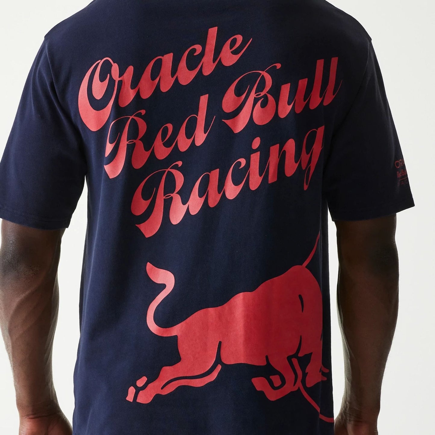 The Male model is wearing Red Bull Racing Back Graphic Dark Blue Oversized T-Shirt 4