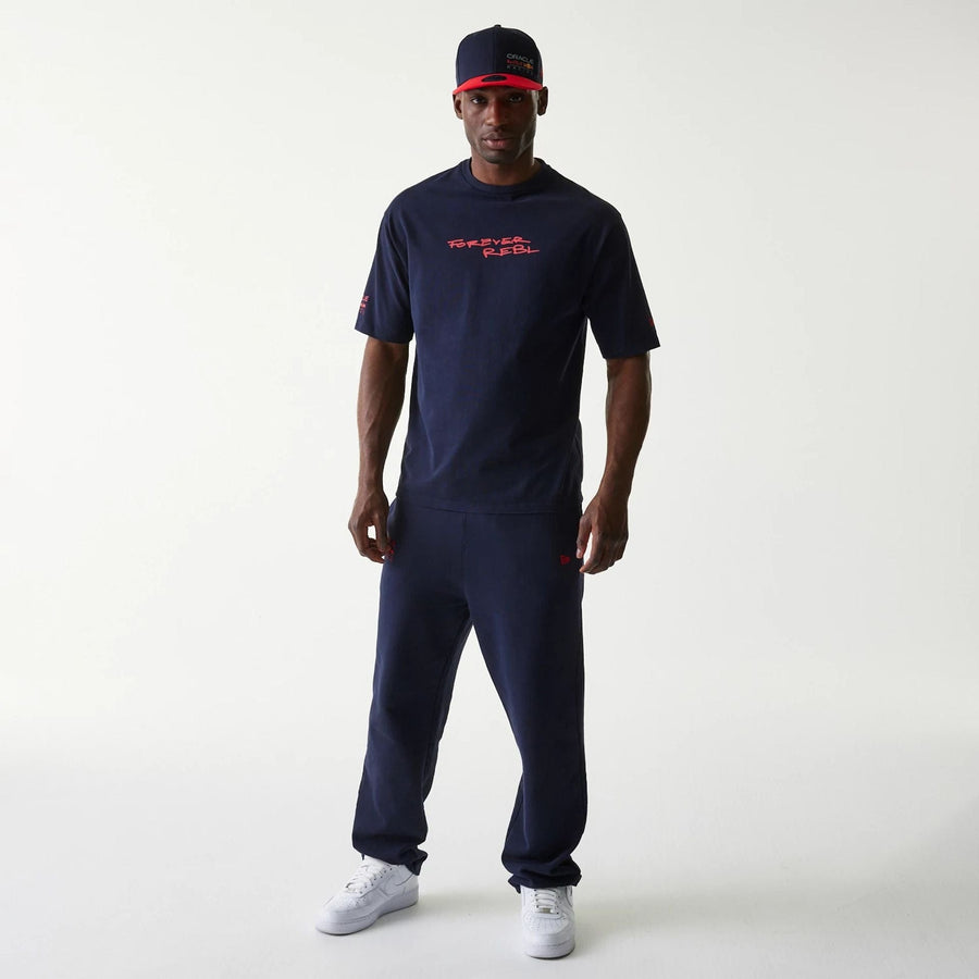 The Male model is wearing Red Bull Racing Back Graphic Dark Blue Oversized T-Shirt 8