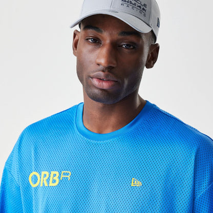 The Male model is wearing Red Bull Racing Graphic Mesh Blue Oversized T-Shirt 3