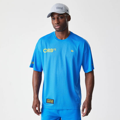 The Male model is wearing Red Bull Racing Graphic Mesh Blue Oversized T-Shirt 1