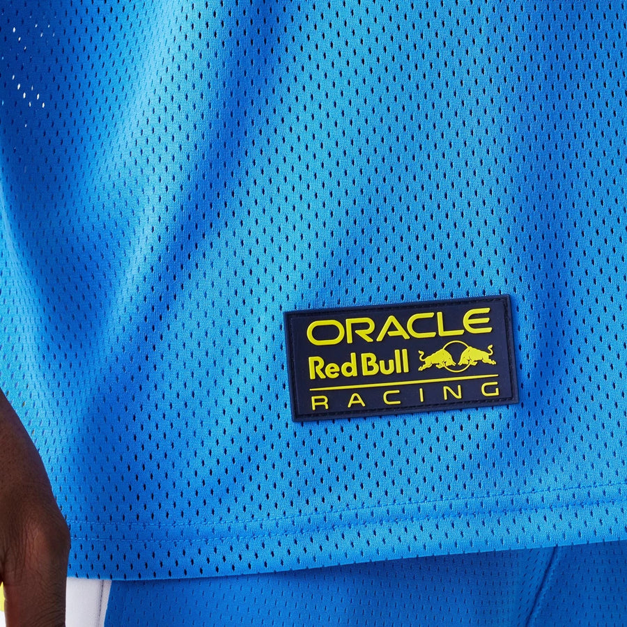 The Male model is wearing Red Bull Racing Graphic Mesh Blue Oversized T-Shirt 5