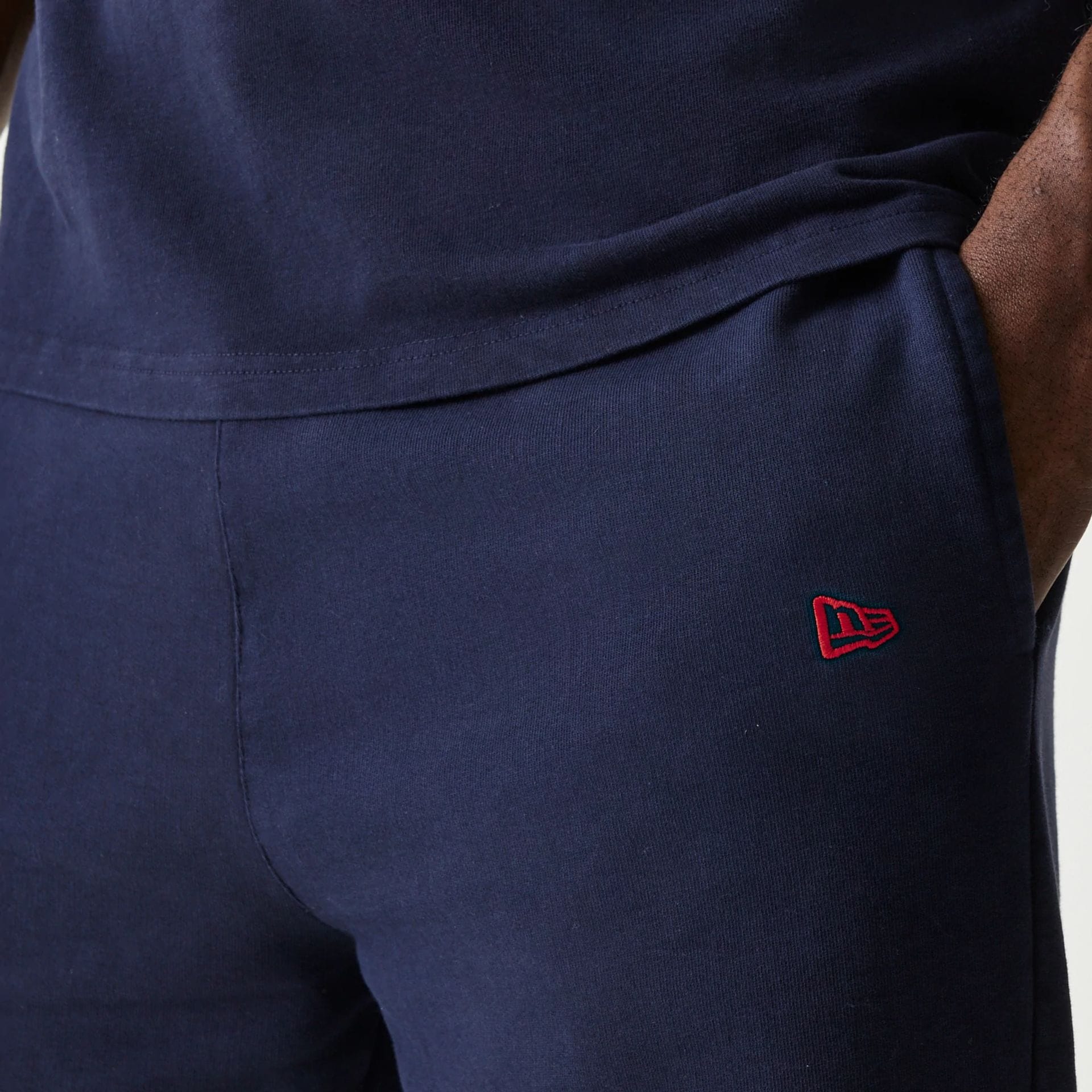 The Male model is wearing Red Bull Racing Dark Blue Joggers 5