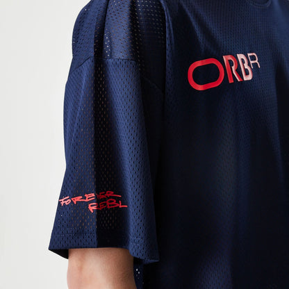 The Male model is wearing Red Bull Racing Graphic Mesh Dark Blue Oversized T-Shirt 3