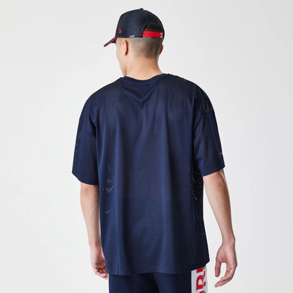 The Male model is wearing Red Bull Racing Graphic Mesh Dark Blue Oversized T-Shirt 2