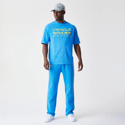 The Male model is wearing Red Bull Racing Blue Joggers 8