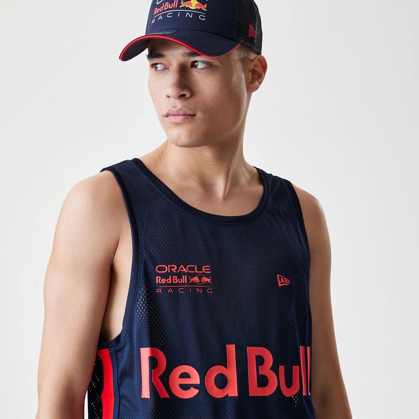The Male model is wearing Red Bull Racing Basketball Mesh Dark Blue Sleeveless T-Shirt 5