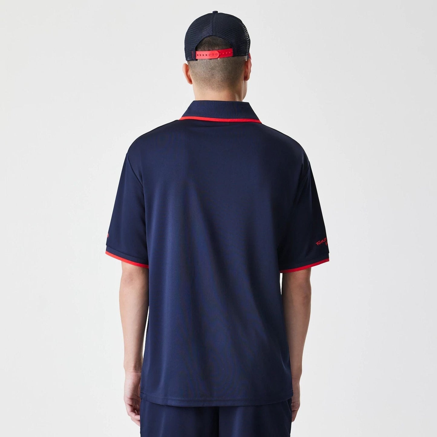 The Male model is wearing Red Bull Racing Graphic Dark Blue Football Jersey 2