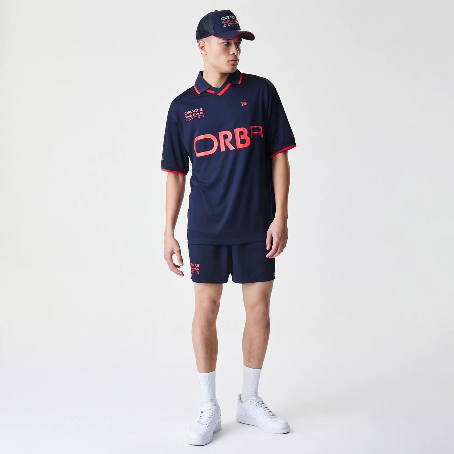 The Male model is wearing Red Bull Racing Graphic Dark Blue Football Jersey 8