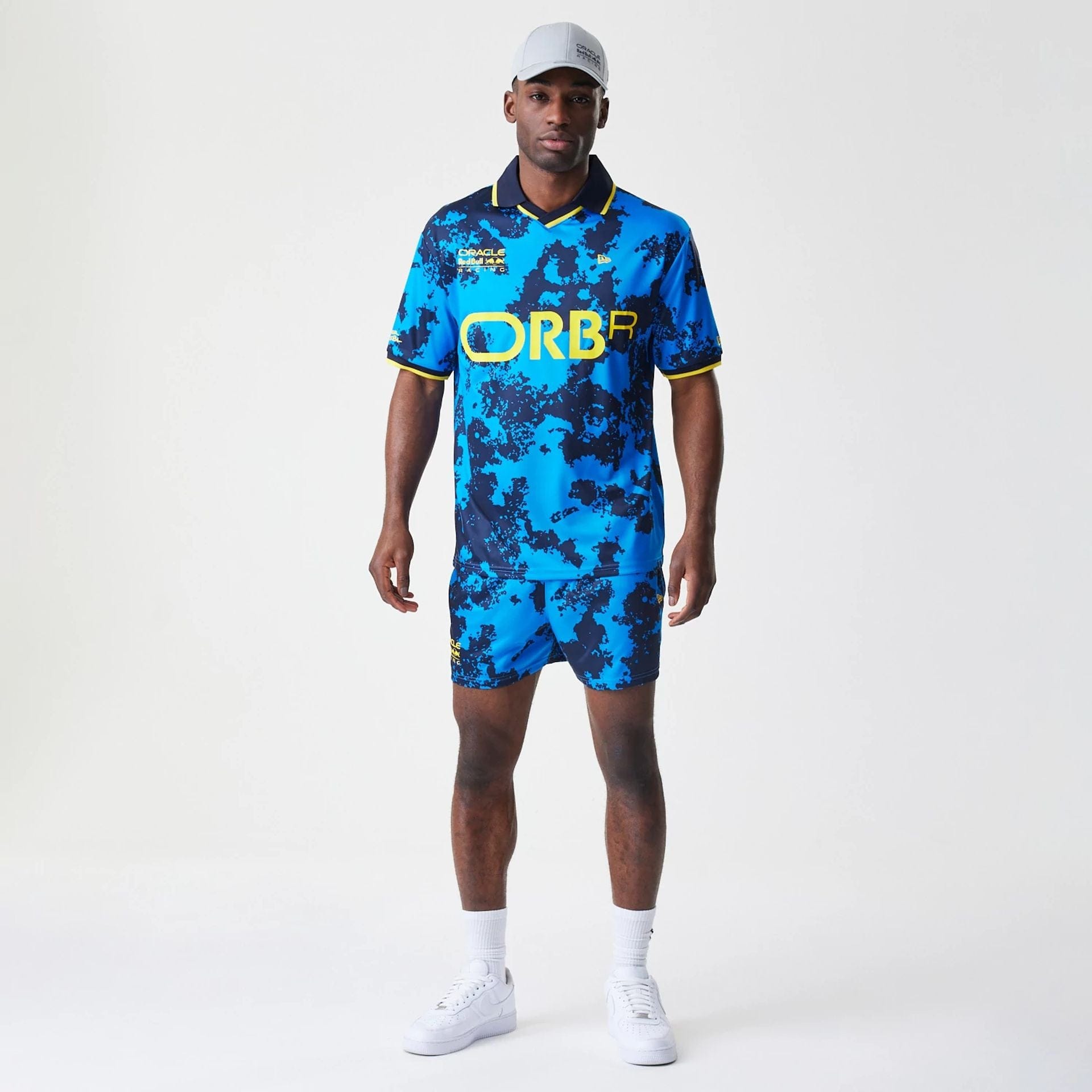 The Male model is wearing Red Bull Racing Graphic Blue Football Jersey 8