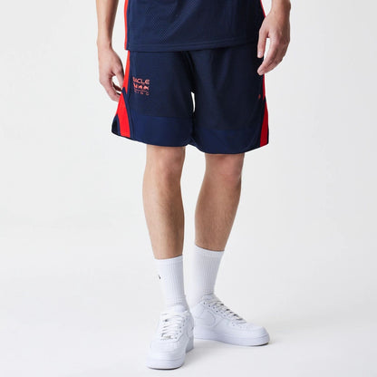 The Male model is wearing Red Bull Racing Basketball Mesh Dark Blue Shorts 1