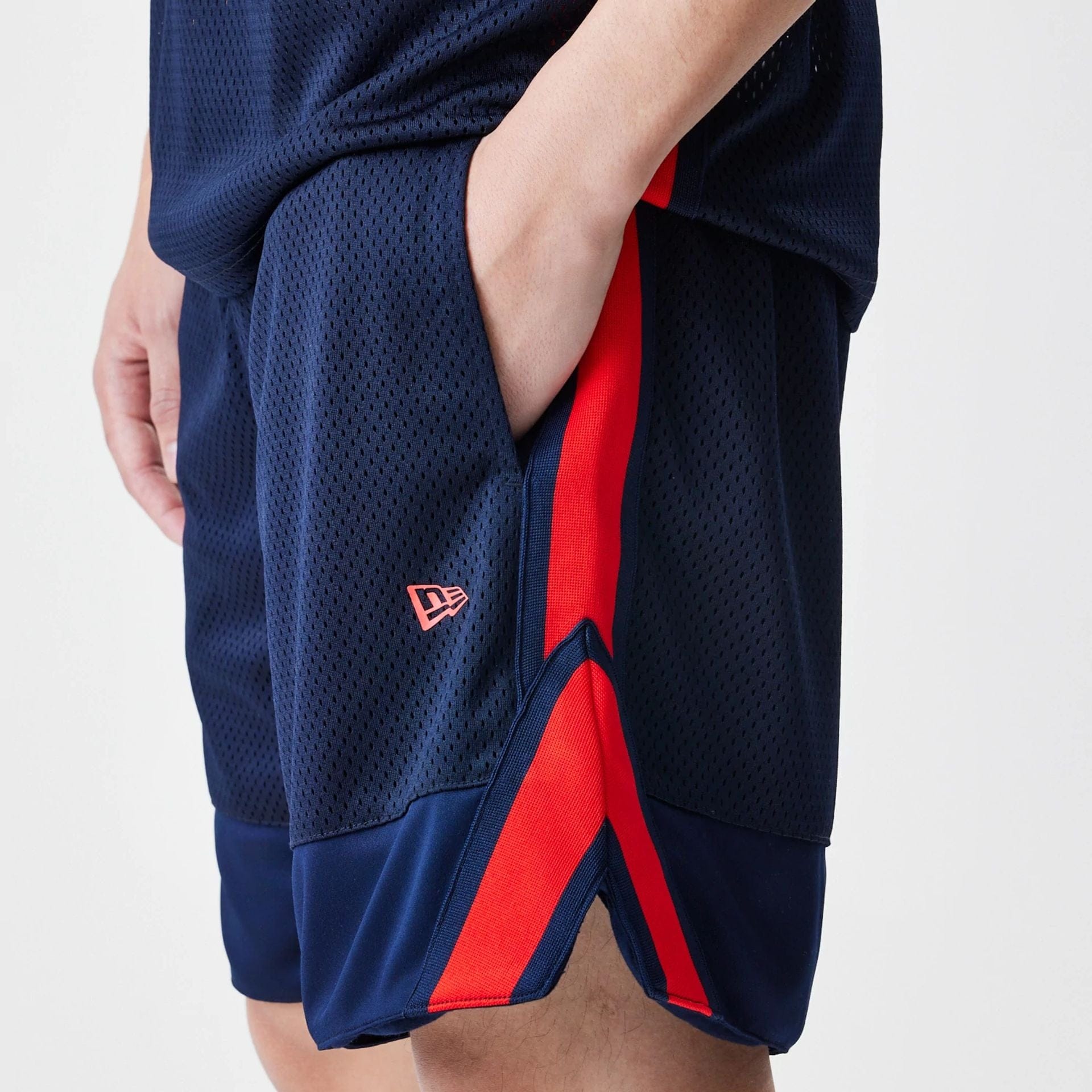 The Male model is wearing Red Bull Racing Basketball Mesh Dark Blue Shorts 6