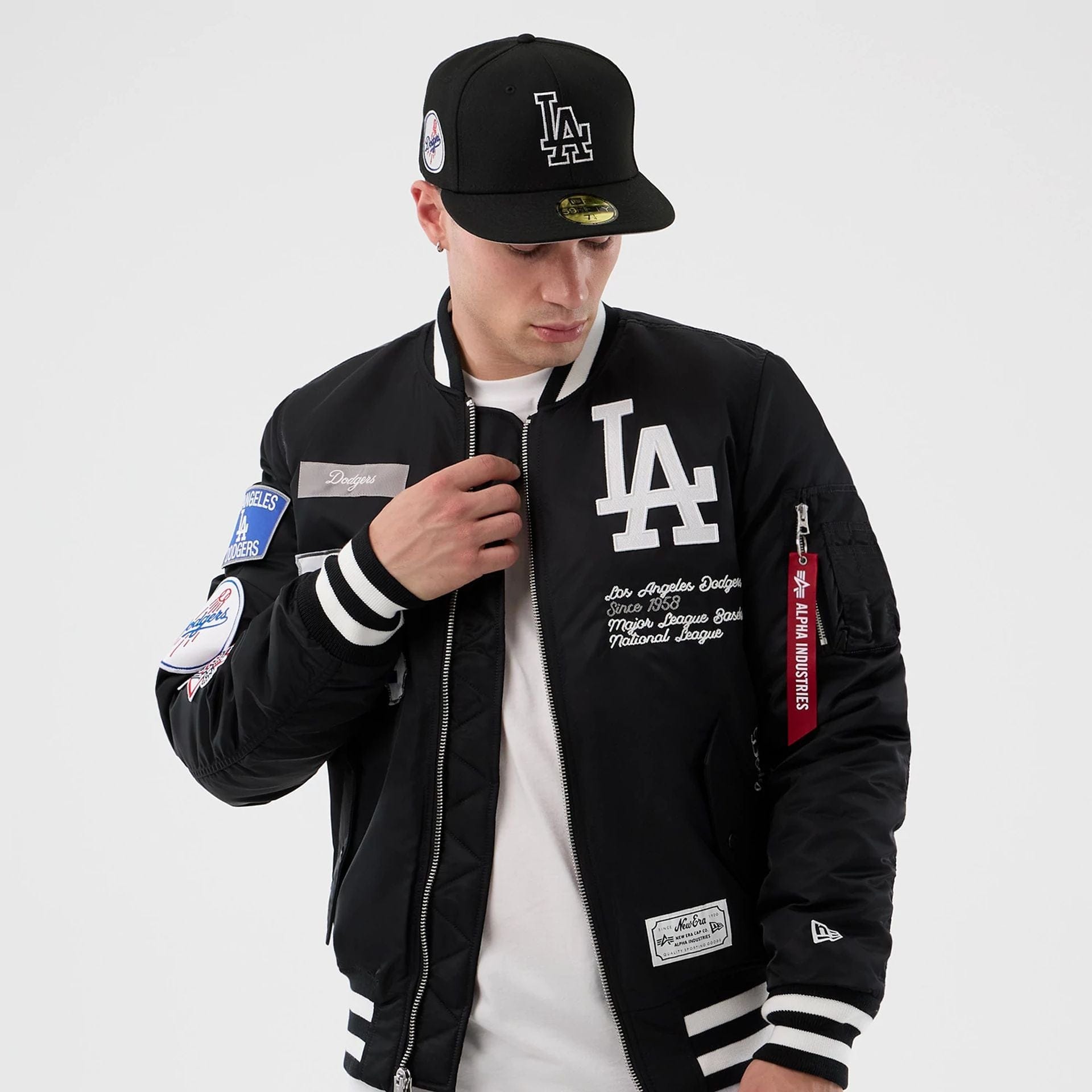 The Male model is wearing LA Dodgers MLB X Alpha Black Bomber Jacket 3