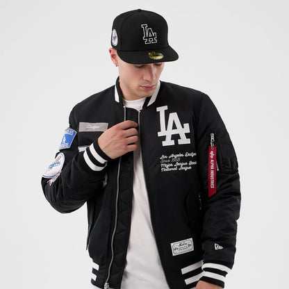 The Male model is wearing LA Dodgers MLB X Alpha Black Bomber Jacket 3