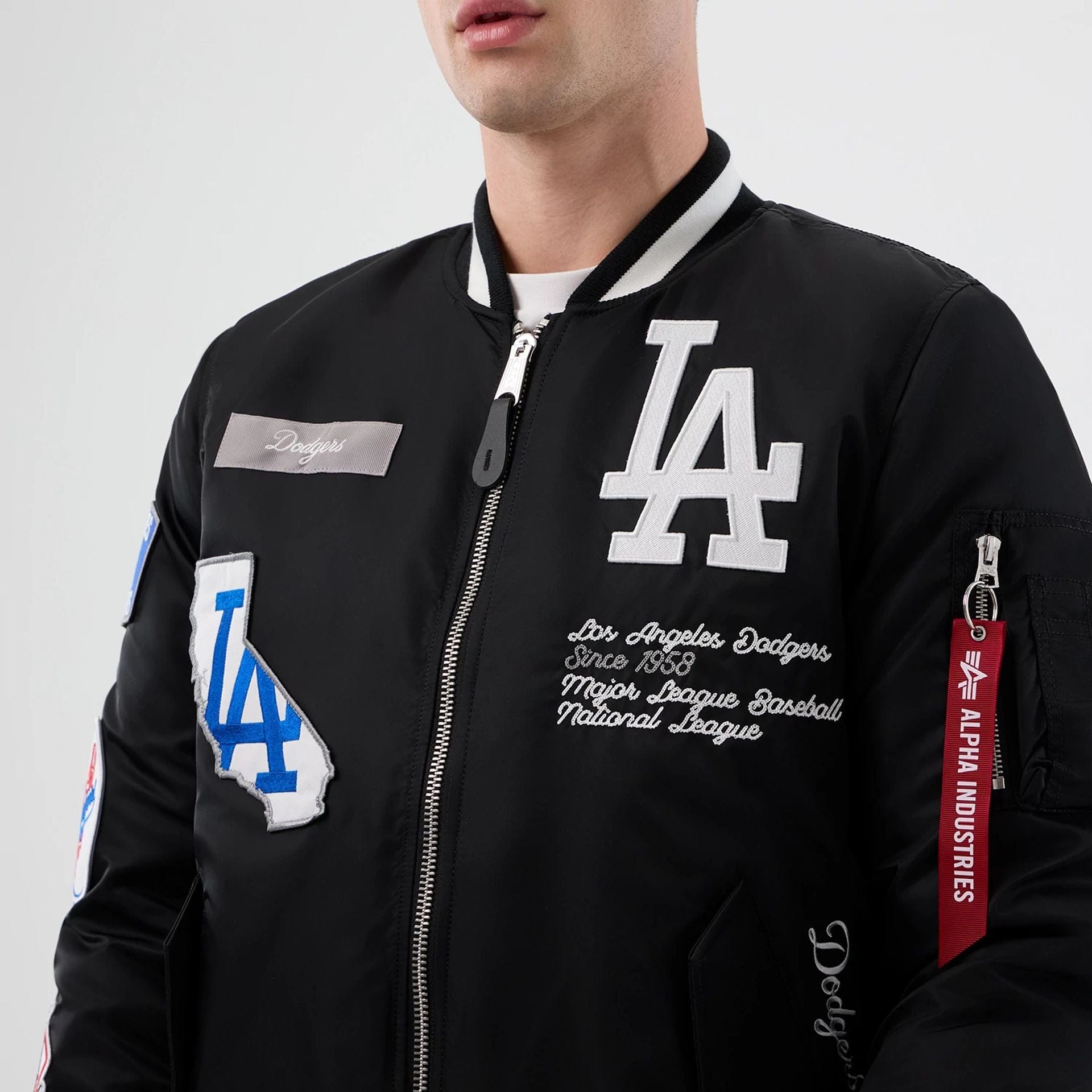 The Male model is wearing LA Dodgers MLB X Alpha Black Bomber Jacket 4