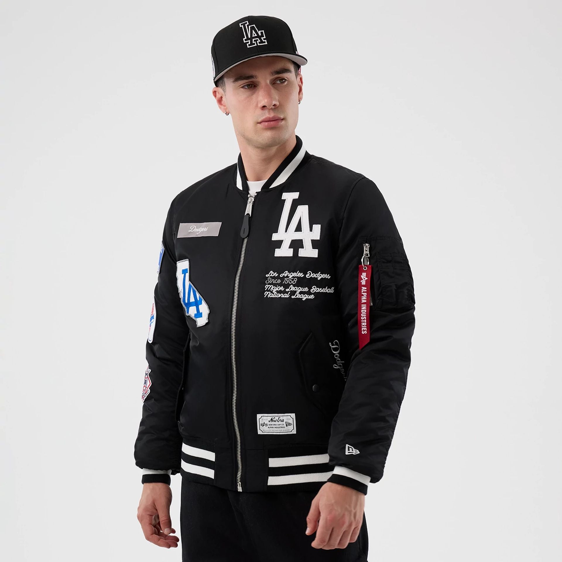 The Male model is wearing LA Dodgers MLB X Alpha Black Bomber Jacket 1