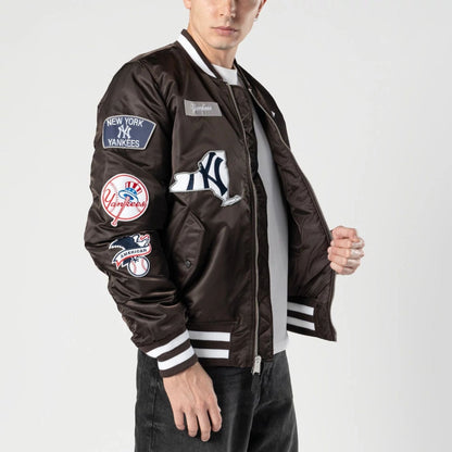 The Male model is wearing New York Yankees MLB X Alpha Dark Brown Bomber Jacket 3