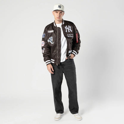 The Male model is wearing New York Yankees MLB X Alpha Dark Brown Bomber Jacket 5