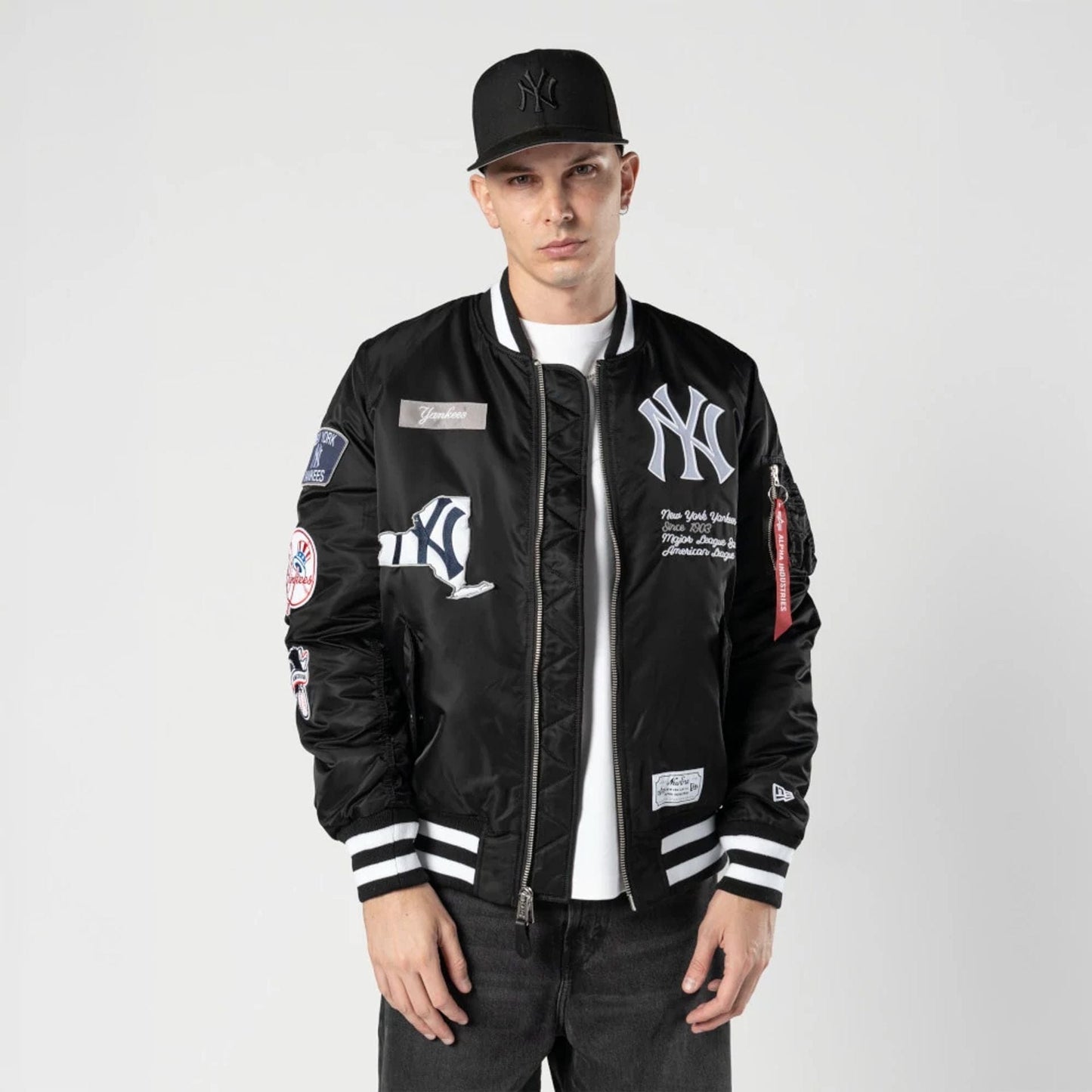 The Male model is wearing New York Yankees MLB X Alpha Black Bomber Jacket 1