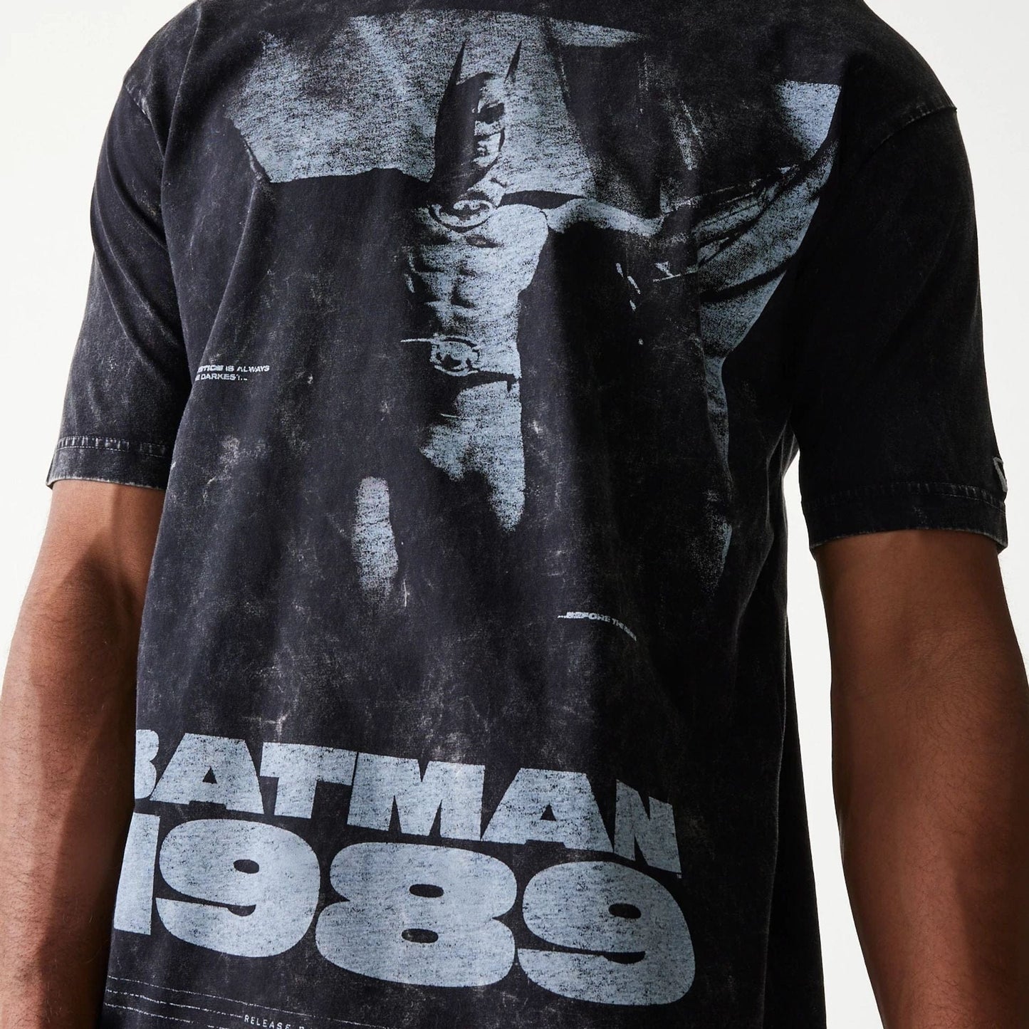 The Male model is wearing Batman 1989 Black T-Shirt 4