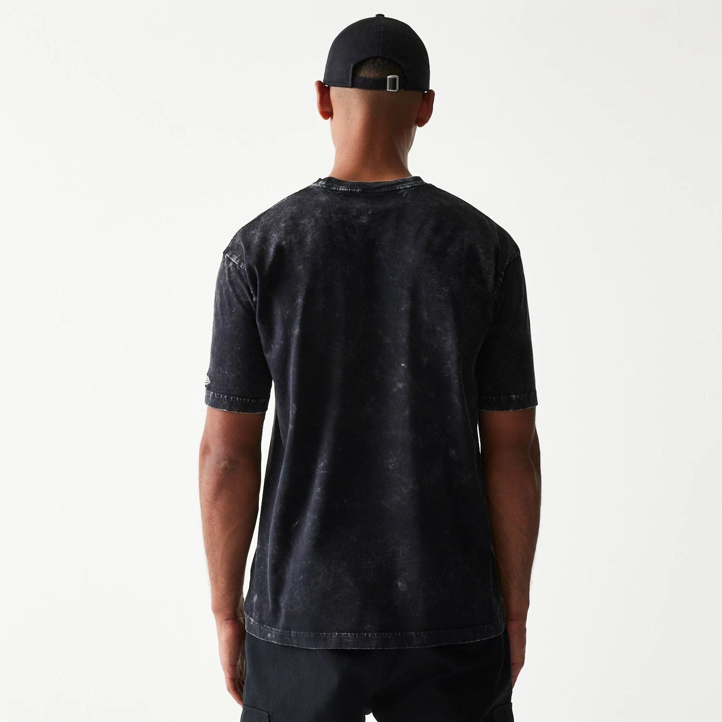 The Male model is wearing Batman 1989 Black T-Shirt 2