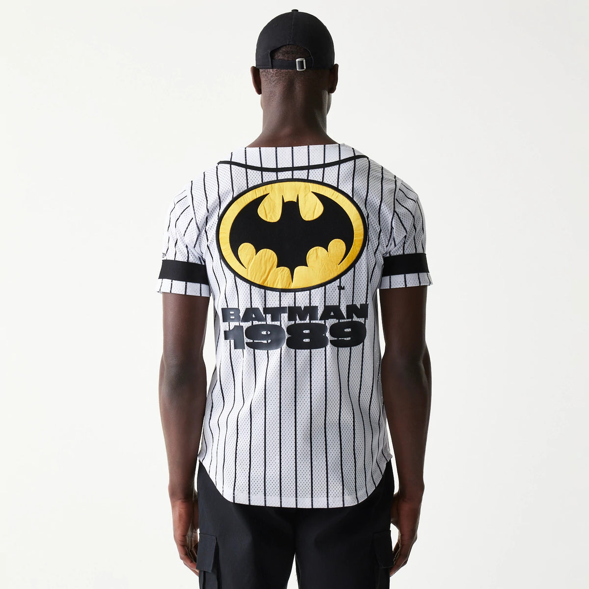 The Male model is wearing Batman Pinstripe White Jersey 2