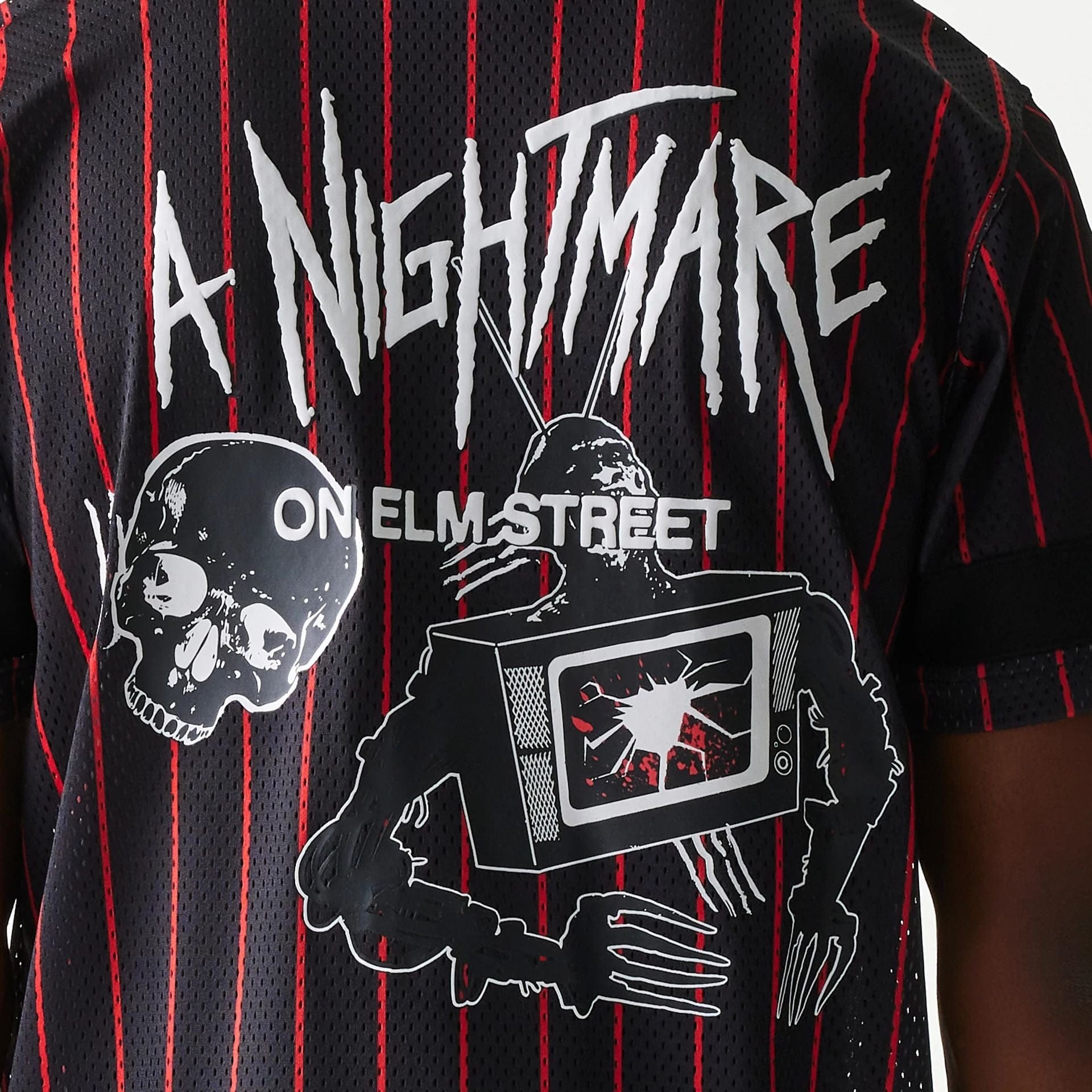 The Male model is wearing A Nightmare On Elm Street Black Jersey 5
