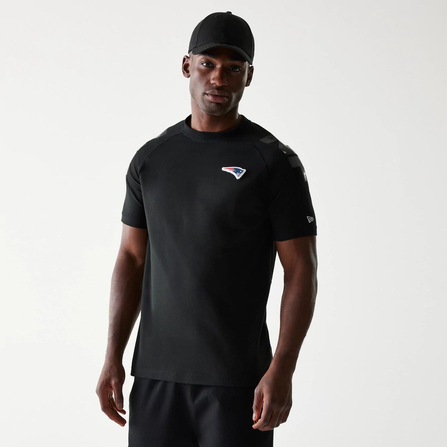 The Male model is wearing New England Patriots NFL 3RD Down Black T-Shirt 4