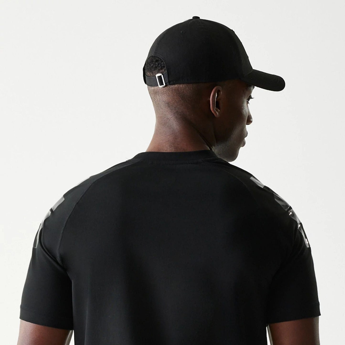 The Male model is wearing New England Patriots NFL 3RD Down Black T-Shirt 6