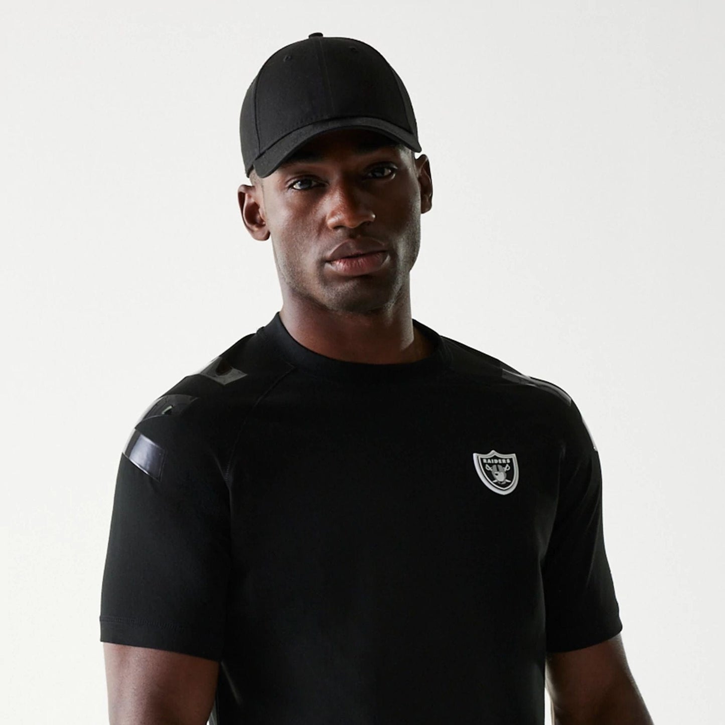 The Male model is wearing Las Vegas Raiders NFL 3RD Down Black T-Shirt 6