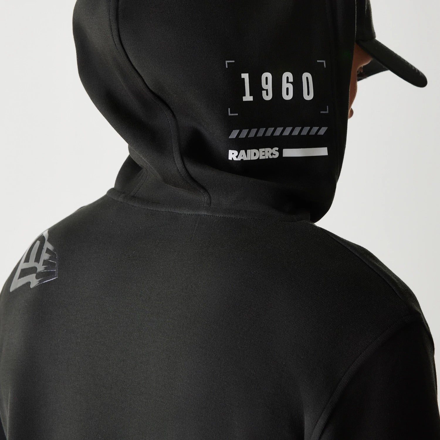 The Male model is wearing Las Vegas Raiders NFL 3RD Down Black Pullover Hoodie 3