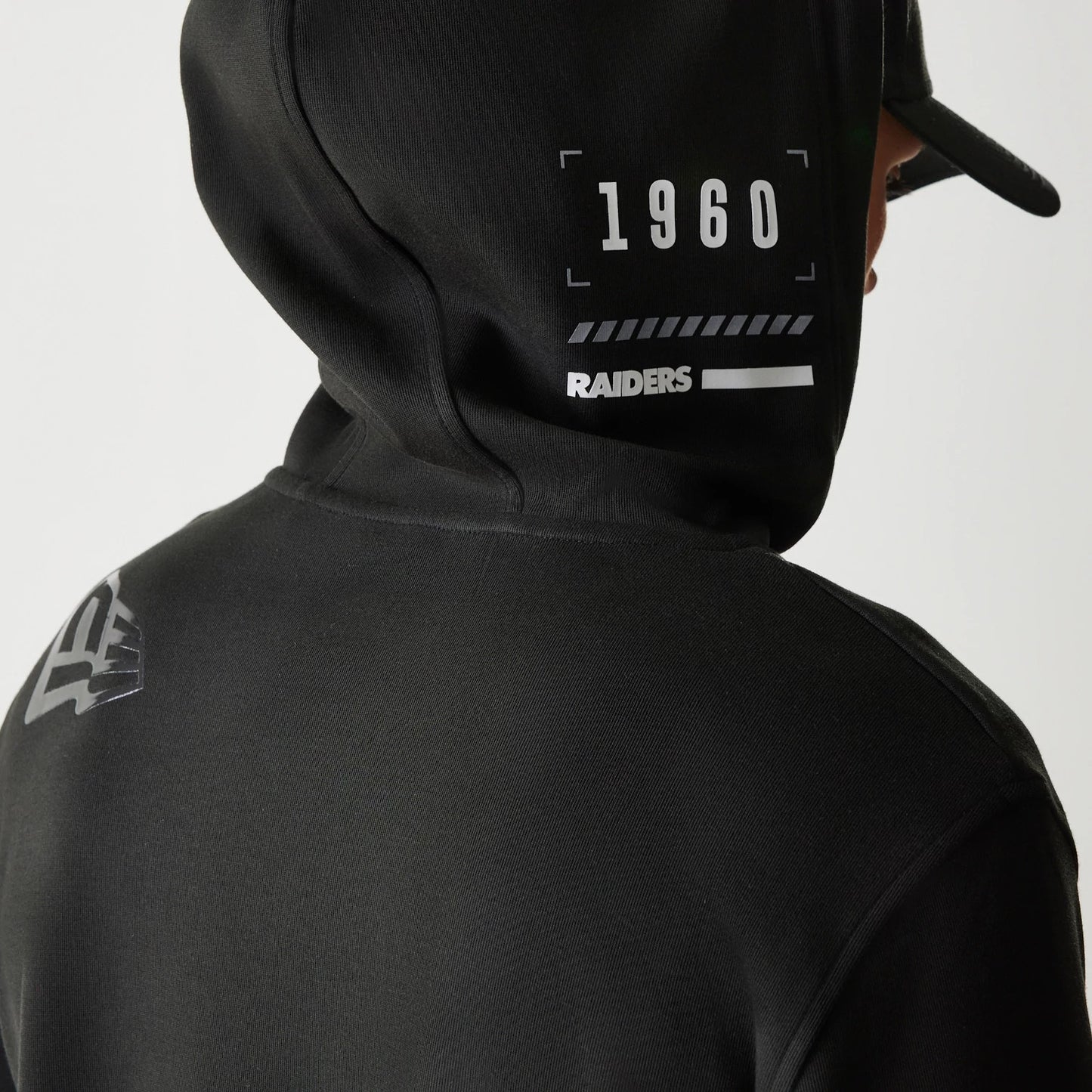 The Male model is wearing Las Vegas Raiders NFL 3RD Down Black Pullover Hoodie 3