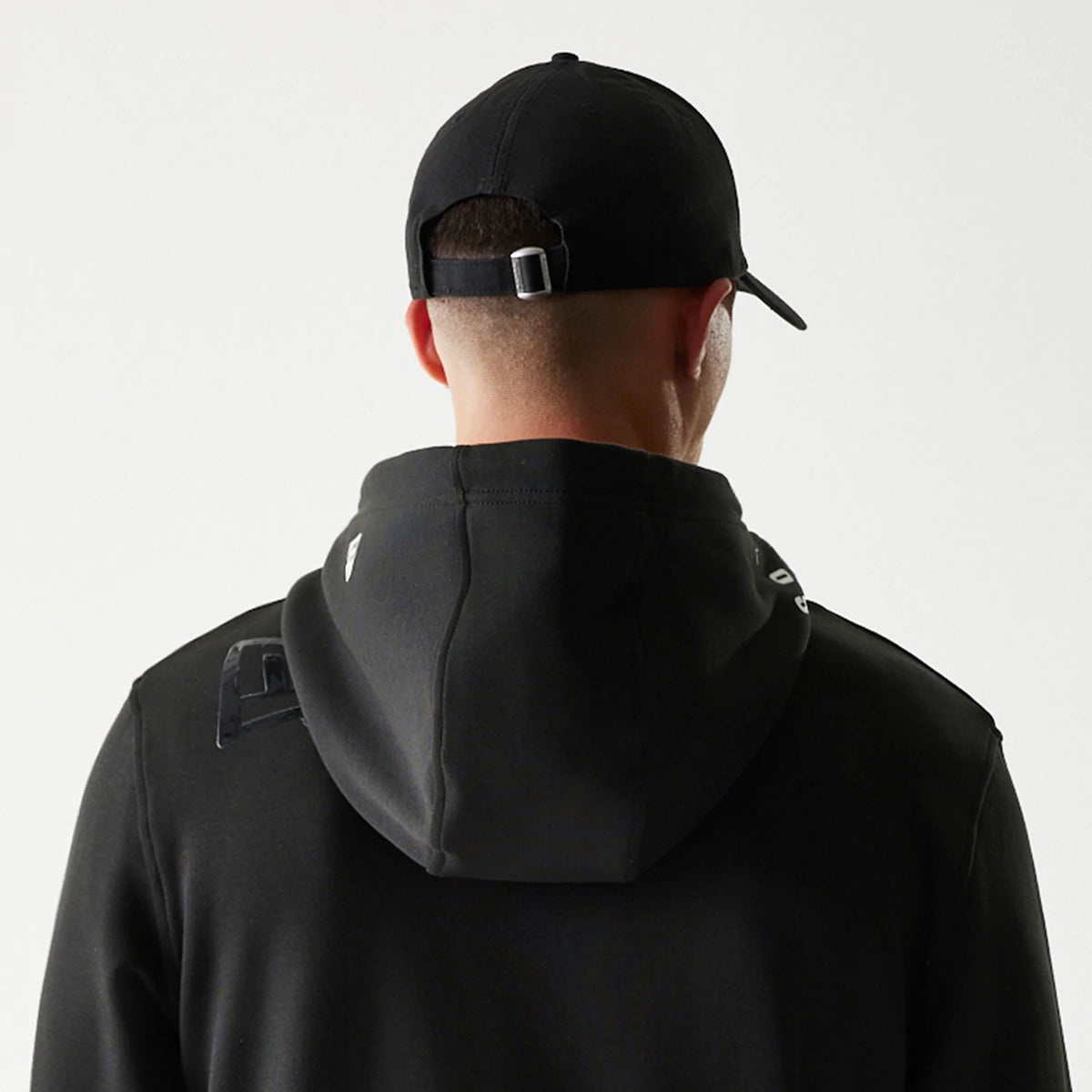 The Male model is wearing Las Vegas Raiders NFL 3RD Down Black Pullover Hoodie 6